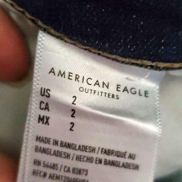 American Eagle Next Level Stretch Hi-Rise Shortie Frayed Distressed Denim Shorts - Picture 13 of 13